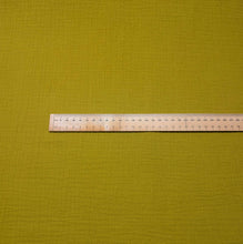 Load image into Gallery viewer, Flat lay of Organic 100% Cotton Double Gauze, Avocado, ruler included for scale - for sale at Minerva's Bower