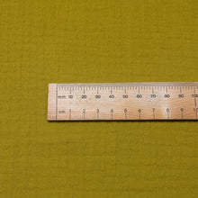 Load image into Gallery viewer, Flat lay of Organic 100% Cotton Double Gauze, Avocado, ruler included for scale  - for sale at Minerva's Bower
