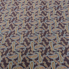 Load image into Gallery viewer, Patterned lyocell fabric with paisley design on a burgundy base, available at Minerva&#39;s Bower