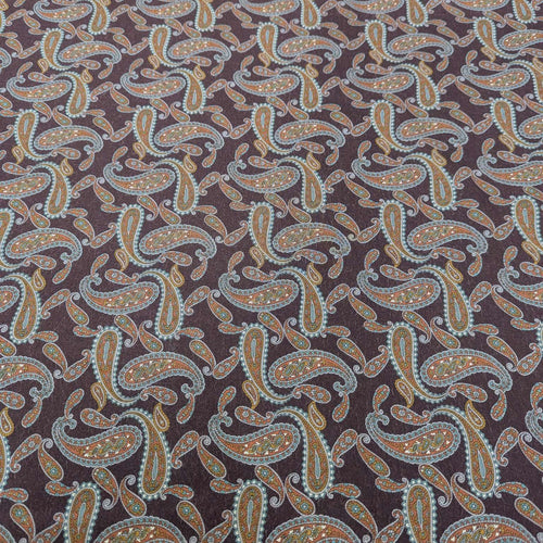 Patterned lyocell fabric with paisley design on a burgundy base, available at Minerva's Bower