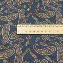 Load image into Gallery viewer, Close up of Patterned lyocell fabric with paisley design on a French Navy base, with a ruler for scale, for sale at Minerva&#39;s Bower