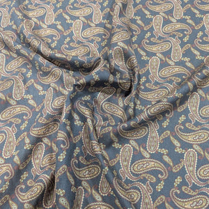 Flat drape of Patterned lyocell fabric with paisley design on a French Navy base, for sale at Minerva's Bower