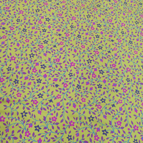 100% cotton Floral patterned fabric with pink and purple flowers on a chartreuse background