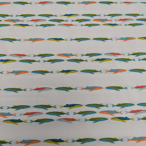 Art gallery fabric with a Pattern of colourful whales on a cream base, for sale at Minerva's Bower 