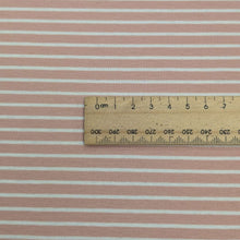 Load image into Gallery viewer, Close up of Whistle Jersey in Petal, stretch cotton jersey in pink with fine white stripe with ruler for scale, for sale at Minerva&#39;s Bower