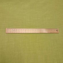 Load image into Gallery viewer, Solid green color cotton fabricswatch with a textured pattern. Available at Minerva's Bower. Ruler included for scale