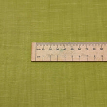 Load image into Gallery viewer, Solid green color cotton fabricswatch with a textured pattern. Available at Minerva's Bower. Ruler included for scale