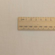 Load image into Gallery viewer, Close up of Premium Pima Cotton from Japan in Beige, available at MInerva&#39;s Bower, with ruler included