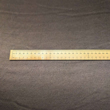 Load image into Gallery viewer, A close-up of a satin twill fabric in a warm taupe-brown color, Prom Viscose, in chocolate. Available at Minerva's Bower. Ruler included for scale
