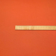 Load image into Gallery viewer, Flat lay of Quackers 100% Cotton Duck, Orange, ruler included - for sale at Minerva's Bower
