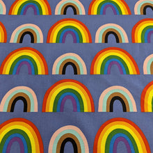 Load image into Gallery viewer, Alexander Henry cotton Fabric with rainbow pattern on a blue background, for sale at Minerva&#39;s Bower