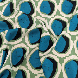 Drape of Rayon with circular teal and black shapes and green and cream accents, for sale at Minerva's Bower