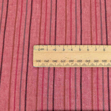 Load image into Gallery viewer, Close up flat lay of Rhubarb Stripe 40% linen 60% cotton, ruler included for scale - for sale at Minerva's Bower