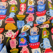 Load image into Gallery viewer, Flat lay of Ruby Star Cotton, Hello Alice. Available at Minerva's Bower. Fabric draped to show how it handles