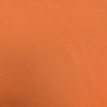 Load image into Gallery viewer, Flat lay of 100% Cotton Seersucker, Terracotta, for sale at Minerva's Bower