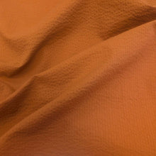 Load image into Gallery viewer, Flat drape of 100% Cotton Seersucker, Terracotta, for sale at Minerva's Bower