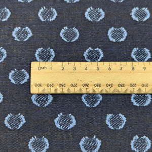 Flat lay of Seren linen cotton jacquard in Indigo. Available at Minerva's Bower. A ruler is included to show scale