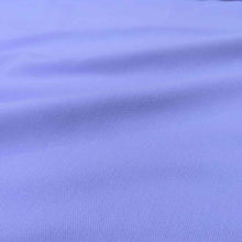 Load image into Gallery viewer, Flat lay of Sonnor stretch cotton Twill in lilac. Available at Minerva&#39;s Bower. Fabric is draped to show how it handles