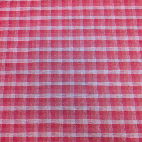 Flat lay of linen cotton Sorbet Gingham, in pinks and white. Available at Minerva's Bower