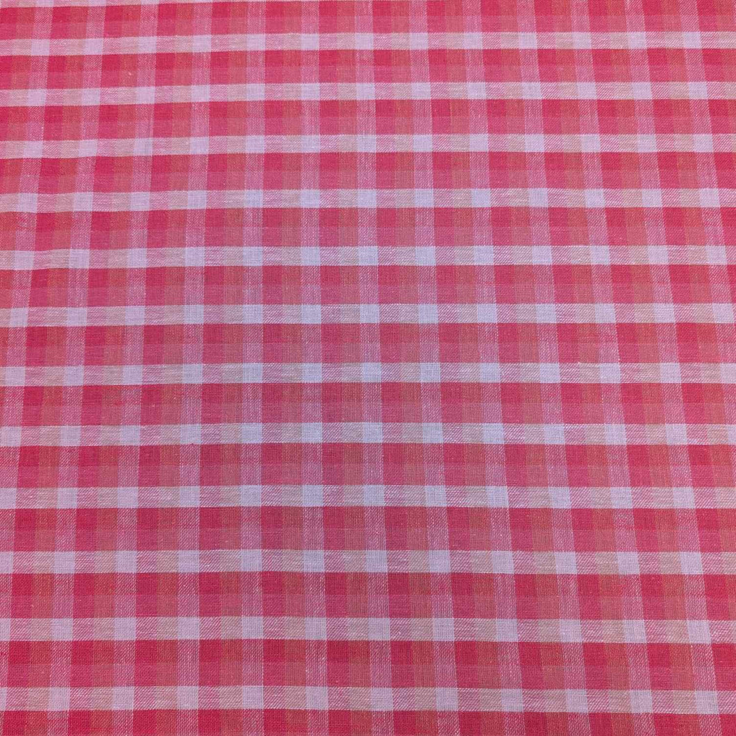 Flat lay of linen cotton Sorbet Gingham, in pinks and white. Available at Minerva's Bower