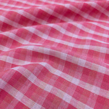 Load image into Gallery viewer, Flat lay of linen cotton Sorbet Gingham, in pinks and white. Available at Minerva&#39;s Bower. Fabric draped to show how it handles