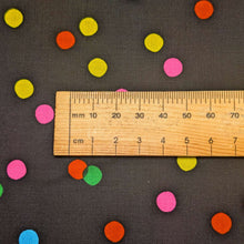 Load image into Gallery viewer, Close up flat lay of 100% cotton Ruby Star, Sparkle Mart Black, ruler included for scale - for sale at Minerva's Bower