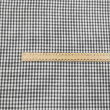 Load image into Gallery viewer, Flat lay of Spencer cotton linen check in grey. Available at Minerva&#39;s Bower. Ruler included for scale