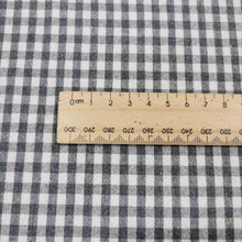 Load image into Gallery viewer, Flat lay of Spencer cotton linen check in grey. Available at Minerva&#39;s Bower. Ruler included for scale