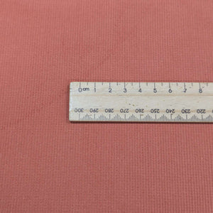 Stretch 14 Wale Cotton Cord, Pumpkin, for sale at Minerva's Bower, ruler included for scale