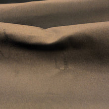 Load image into Gallery viewer, close up of chocolate pinwale stretch cotton corduroy. Available at Minerva's Bower. Fabric draped to show how it handles