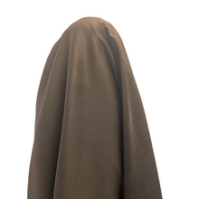 Load image into Gallery viewer, close up of chocolate pinwale stretch cotton corduroy. Available at Minerva's Bower. Fabric draped to show how it handles
