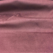 Load image into Gallery viewer, Close-up of a claret pinwale corduroy fabric surface. Available at Minerva's Bower. Fabric draped to show how it hangs