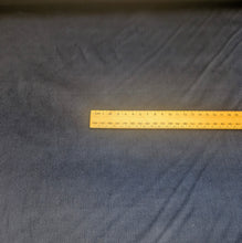 Load image into Gallery viewer, Close-up of navy pinwale stretch corduory fabric. Available at Minerva's Bower. Ruler included for scale