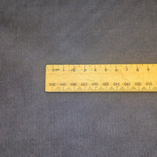 Load image into Gallery viewer, Close-up of navy pinwale stretch corduory fabric. Available at Minerva's Bower. Ruler included for scale