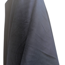 Load image into Gallery viewer, Close-up of navy pinwale stretch corduory fabric. Available at Minerva's Bower. Fabric draped to show how it handles