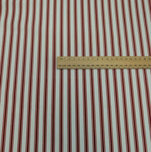 Load image into Gallery viewer, Flat lay of 100% Cotton Canvas Ticking Stripe, Garnet, for sale at Minerva's Bower, ruler included for scale