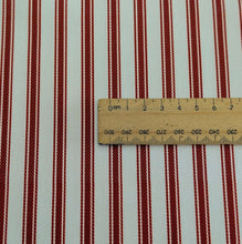 Load image into Gallery viewer, Close up flat lay of 100% Cotton Canvas Ticking Stripe, Garnet, for sale at Minerva's Bower, ruler included for scale