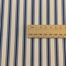 Load image into Gallery viewer, Close up flat lay of 100% Cotton Canvas Ticking Stripe,Navy, for sale at Minerva's Bower, ruler included for sclae
