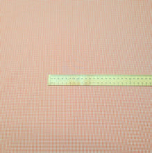 Load image into Gallery viewer, Flat lay of yarn dyed Japanese 100% Cotton, Tiny Gingham Orange, ruler included for scale - for sale at Minerva's Bower