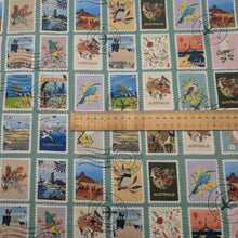 Load image into Gallery viewer, Flat lay of 100% Cotton by Devonstone, Aussie Backyard Travel Stamps, ruler included for scale - for sale at Minerva's Bower