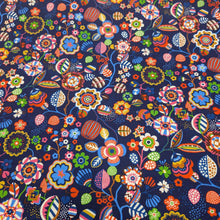Load image into Gallery viewer, Flat lay of Thread and Ink 100% Cotton, Tree Flower Navy Blue cloth with vibrant multicolour retro floral design - for sale at Minerva's Bower