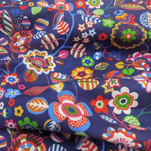 Load image into Gallery viewer, Flat drape of Thread and Ink 100% Cotton, Tree Flower Navy Blue cloth with vibrant multicolour retro floral design - for sale at Minerva's Bower