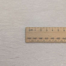 Load image into Gallery viewer, Close up of Vintage Satin Acetate, Ivory, made in Japan, for sale at Minerva's Bower, ruler included for scale