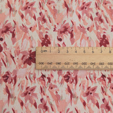 Load image into Gallery viewer, Close up of Japanese cotton fabric with a floral pattern with small flowers in pinks and cream,  with ruler included for scale, for sale at Minerva&#39;s Bower
