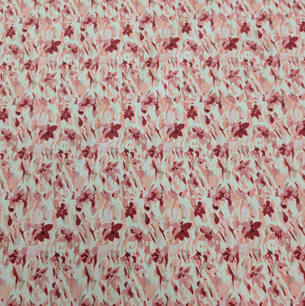 Japanese cotton fabric with a floral pattern with small flowers in pinks and cream, for sale at Minerva's Bower