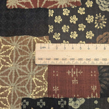 Load image into Gallery viewer, Close up flat lay of Japanese 100% Cotton, Wagara Brown, for sale at Minerva's Bower, ruler included for scale