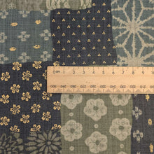 Load image into Gallery viewer, Close up flat lay of Japanese 100% Cotton, Wagara Green, for sale at Minerva's Bower, ruler included for scale