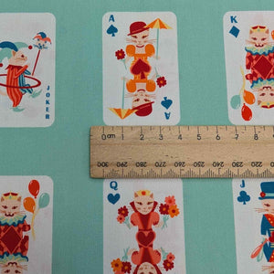 Close up of Art Gallery 100% Cotton, Purr Parade Whisker Deck, with a ruler included for scale, for sale at Minerva's Bower