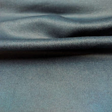 Load image into Gallery viewer, Close up of textured pure wool in Mallard colourway. Available at Minerva's Bower. Fabric draped to show how it handles