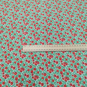 Flat Lay of Liberty Lasenby Cotton, Yew Berries, Ruler Included for scale, for sale at Minerva's Bower